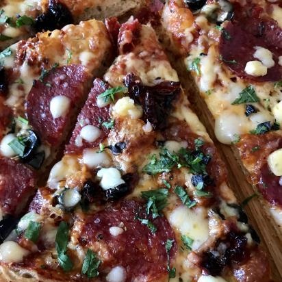 Tomàquets secs al forn amb oli perfumat (cocció i conserva)