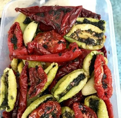 Tomàquets secs al forn amb oli perfumat (cocció i conserva)