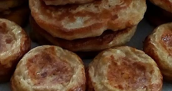 Filled pancakes or lazy pies with cabbage and eggs