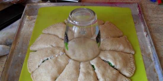 Octopus pie with whole grain flour, cottage cheese and herbs