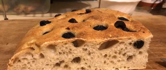 Focaccia with olives and tomatoes on rye sourdough