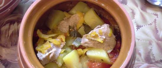 Pot of meat and vegetables with broth