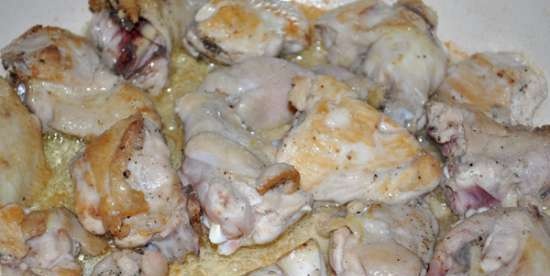 Chicken with mushrooms in tomato and sour cream sauce