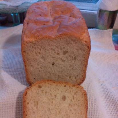 Spicy bread with garlic and herbs in a bread maker