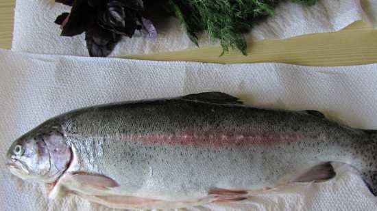 Trout baked in the oven with vegetables