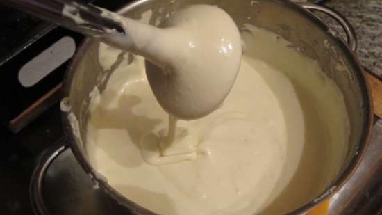 Homemade processed cheese in a milk cooker