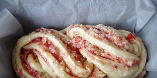 Roll with coconut and strawberry jam