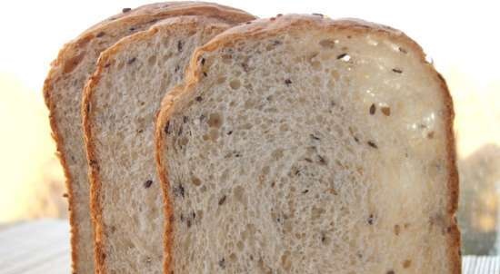 Pane di grano con semi di lino, sesamo e girasole in una macchina per il pane