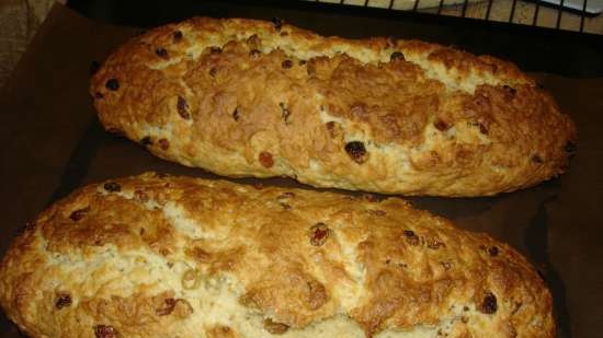 Festive curd roll with candied fruits and raisins