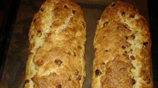 Festive curd roll with candied fruits and raisins