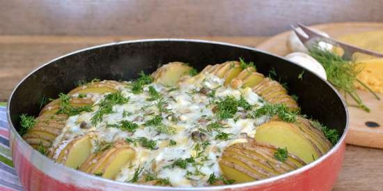 Papas al horno con salsa de queso y champiñones