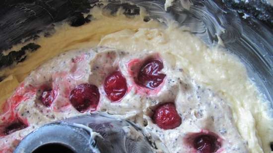 Cupcake with poppy seeds and cherries