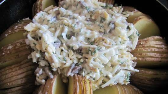 Papas al horno con salsa de queso y champiñones