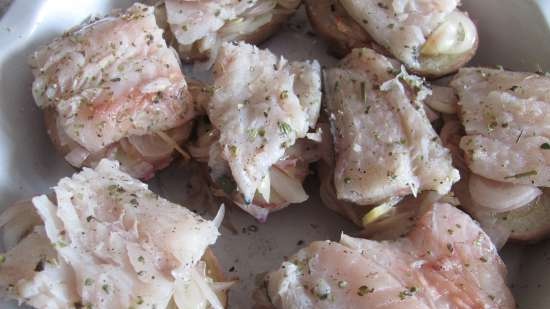 Jacket potatoes baked with hake