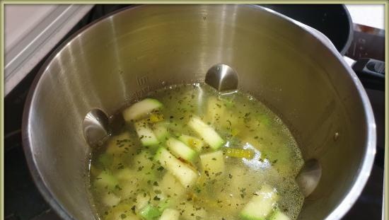 Mashed potato, celery and zucchini soup with basil