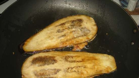 Eggplant rolls with mushrooms in pancake breading