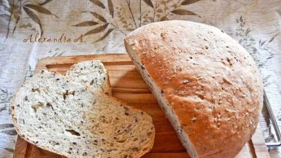 Pane di grano con semi di lino, sesamo e girasole in una macchina per il pane