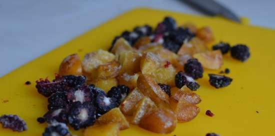 Plum and blackberry ice cream with pieces of berries