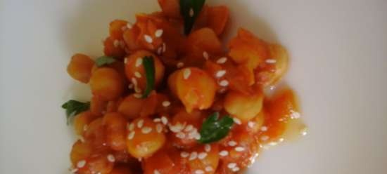 Two spicy chickpea dishes: salad and fish in chickpea sauce