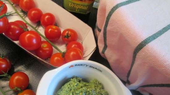 Focaccia with pesto sauce and cherry tomatoes