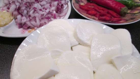 Pork chops baked with two cheeses