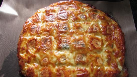 Focaccia con mozzarella, aglio ed erbe aromatiche