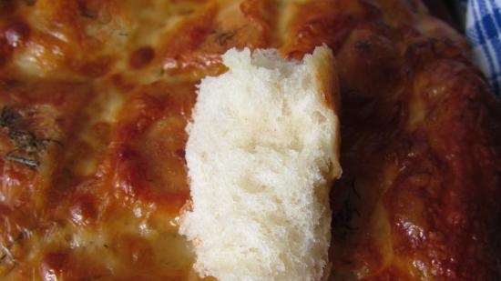 Focaccia con mozzarella, aglio ed erbe aromatiche