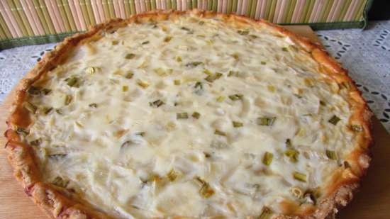 Onion pie with sour cream filling on wheat-rye dough