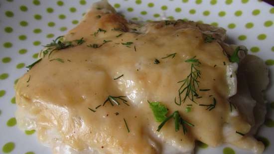 Potatoes baked with milk sauce