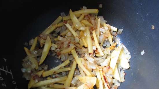 Pork baked with turnips and sauerkraut in pots