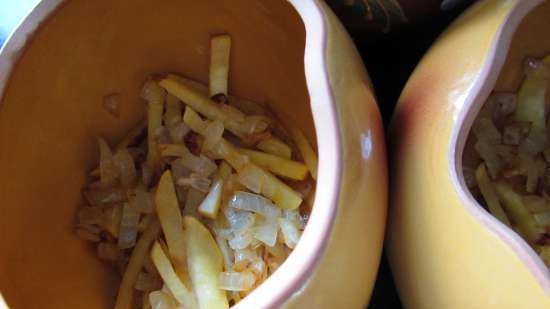 Pork baked with turnips and sauerkraut in pots