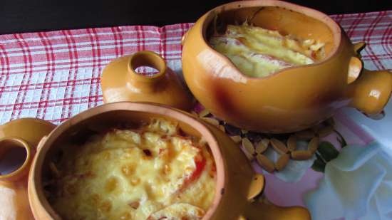 Pork baked with turnips and sauerkraut in pots