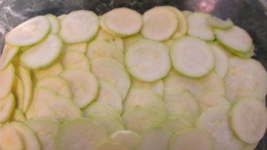 Zucchini-tomato casserole with cheese and bread crumbs