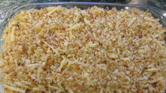 Zucchini-tomato casserole with cheese and bread crumbs