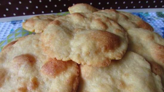 Tortas finas de trigo y maíz elaboradas con queso fundido