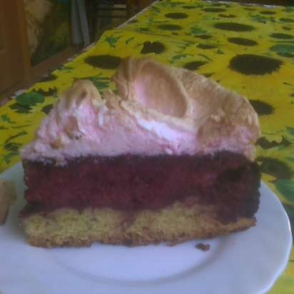 Pastel de cuajada y bayas con soufflé