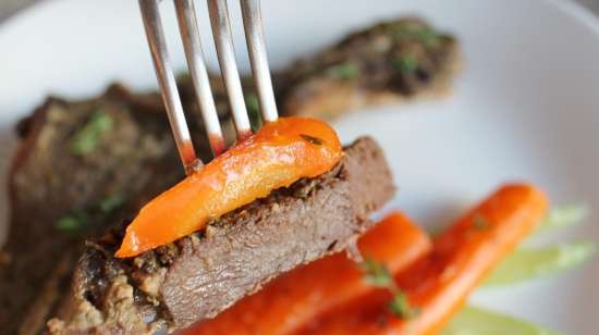 Venison on the bone, baked with herbs in a marinade