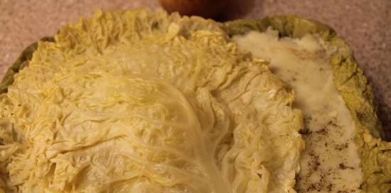 Savoy cabbage casserole with potato-fern filling