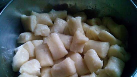 Dumplings (potato lazy dumplings) with veal in sour cream sauce