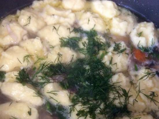 Chicken soup with bulgur, mushrooms and potato dumplings