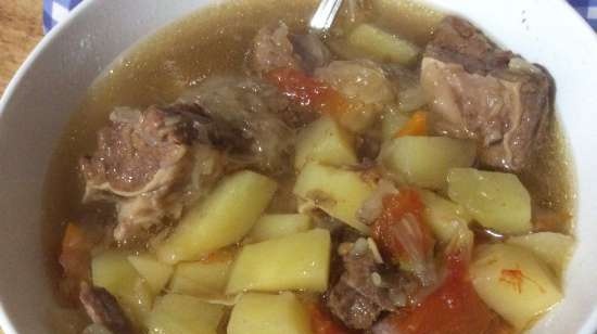 Cabbage soup with sauerkraut in a slow cooker