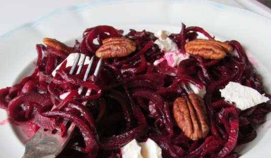 Beet spaghetti with goat cheese and pecans