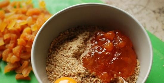 Rolled cake with dried apricots and almonds filling