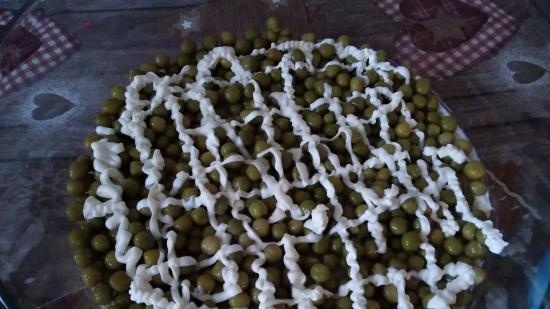 Puff salad with sprats