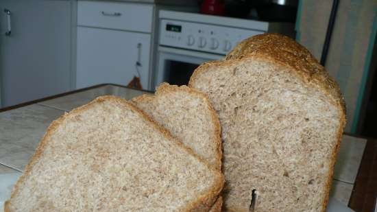 Wheat bread with whole grain flour and bran on yogurt