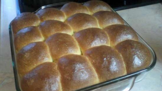 Pumpkin buns with apple and raisins in a creamy filling