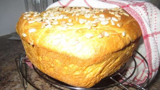 Pumpkin bread on broth with seeds in the oven