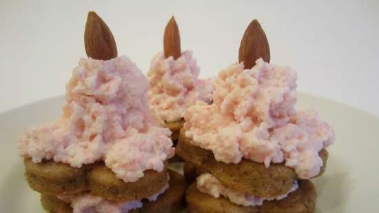 Almond and fish cookies with crab cream