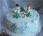 Torta di famiglia del pupazzo di neve