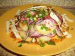 Potato salad with radish, cheese, red flounder caviar